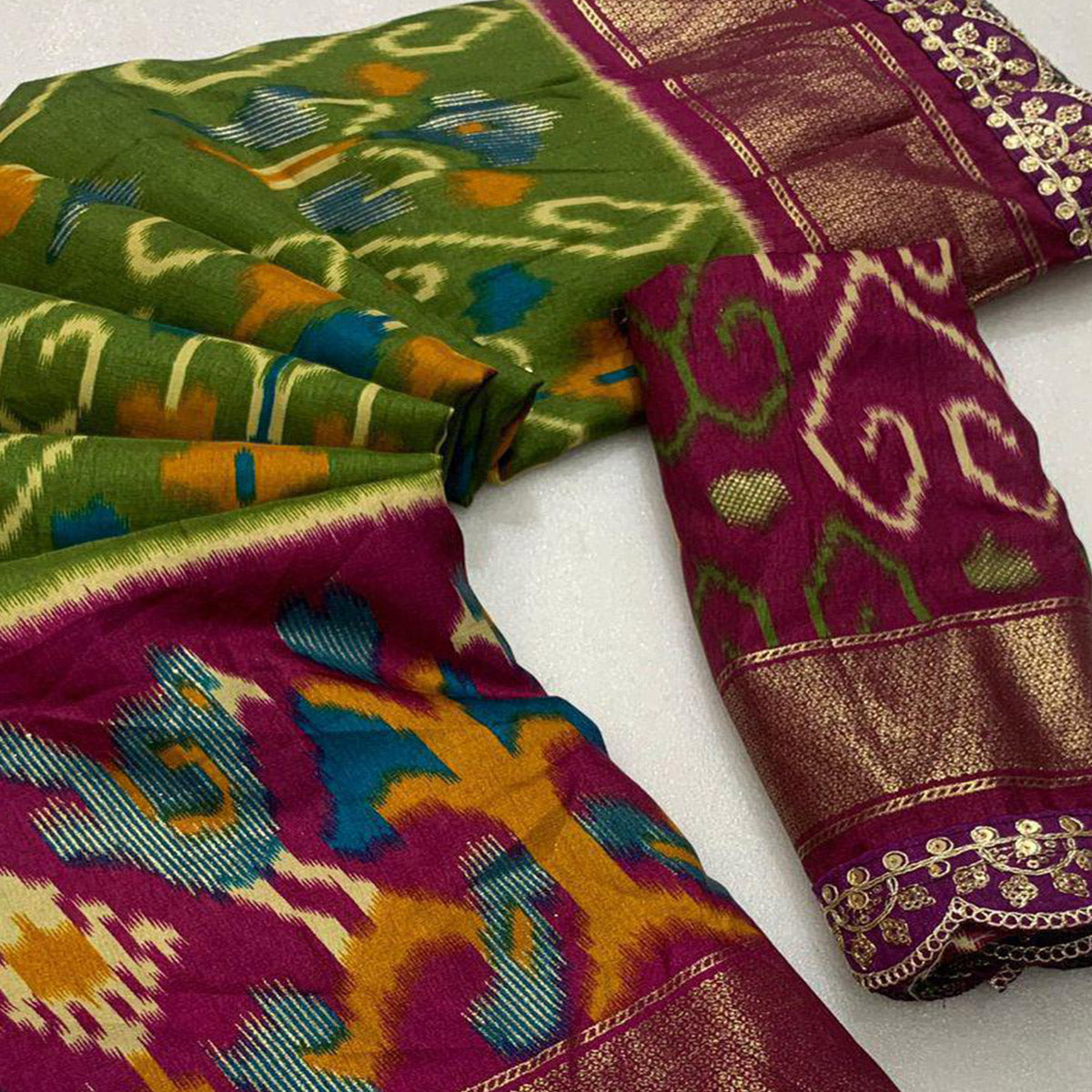 green-wine-ikkat-printed-dola-silk-saree-with-sequins-embroidered-border