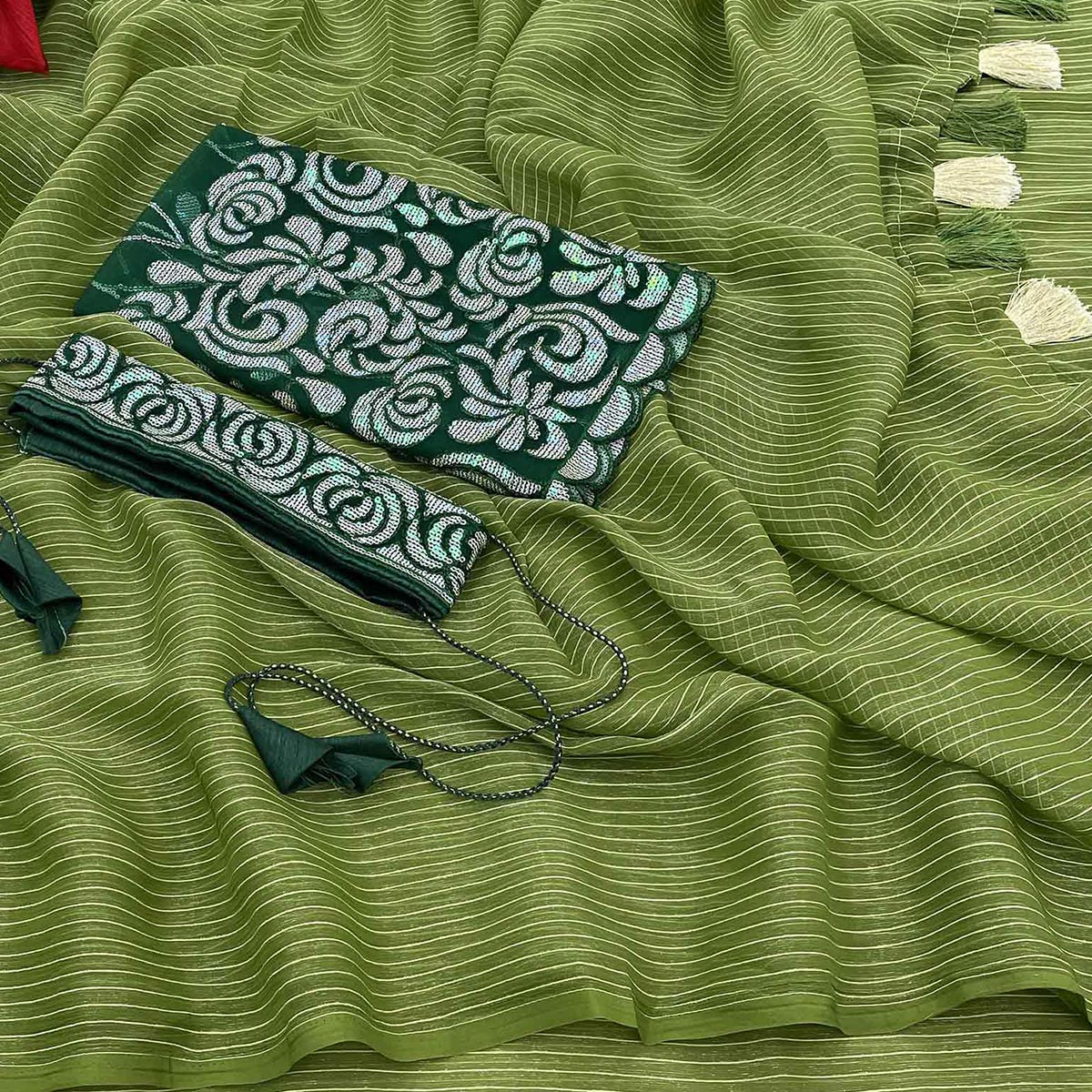 green-striped-chiffon-saree-with-tassels