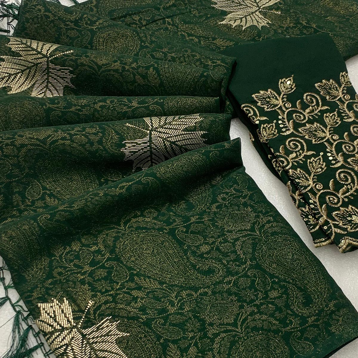 green-foil-printed-georgette-saree-with-with-tassels