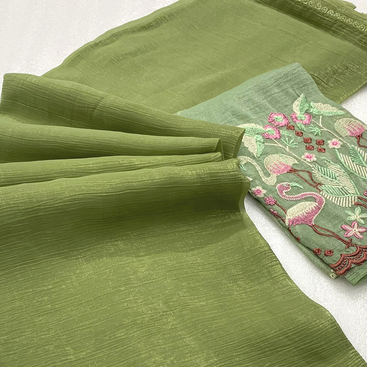 green-solid-crunchy-crepe-saree-with-embroidery-border
