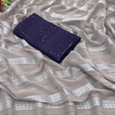 Grey Zari Striped Georgette Saree With Tassels