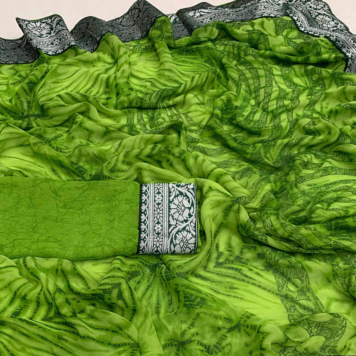 green-shibori-printed-georgette-saree-with-woven-border