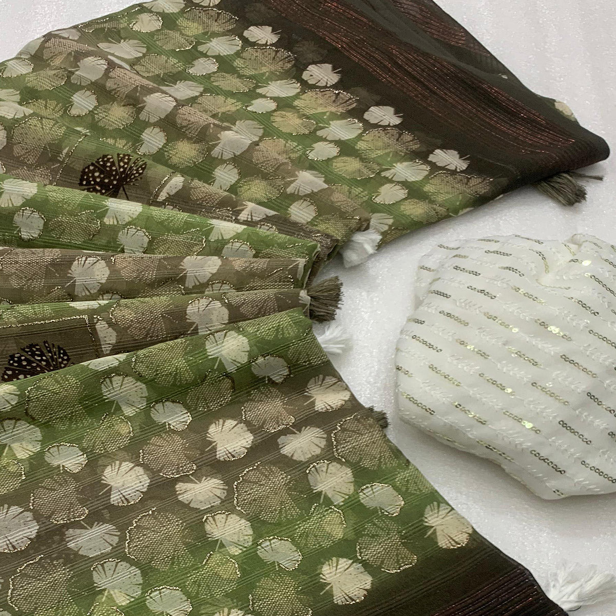 Mehendi Green Floral Foil Printed Georgette Saree With Tassels