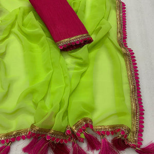 green-solid-georgette-saree-with-embroidered-lace-border-tassels