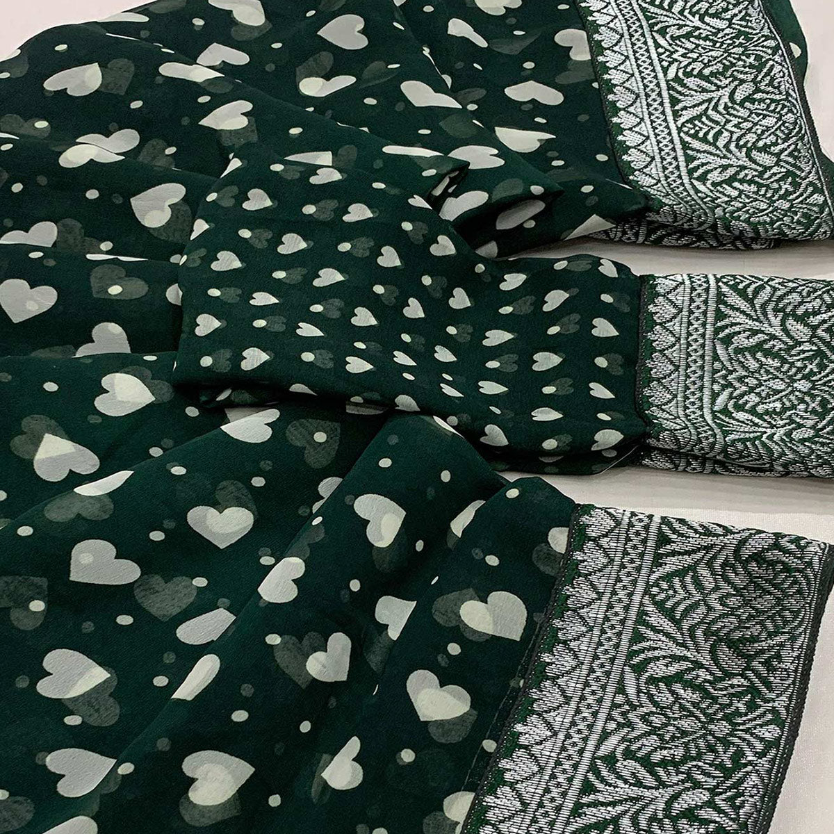 green-heart-printed-georgette-saree-with-woven-border