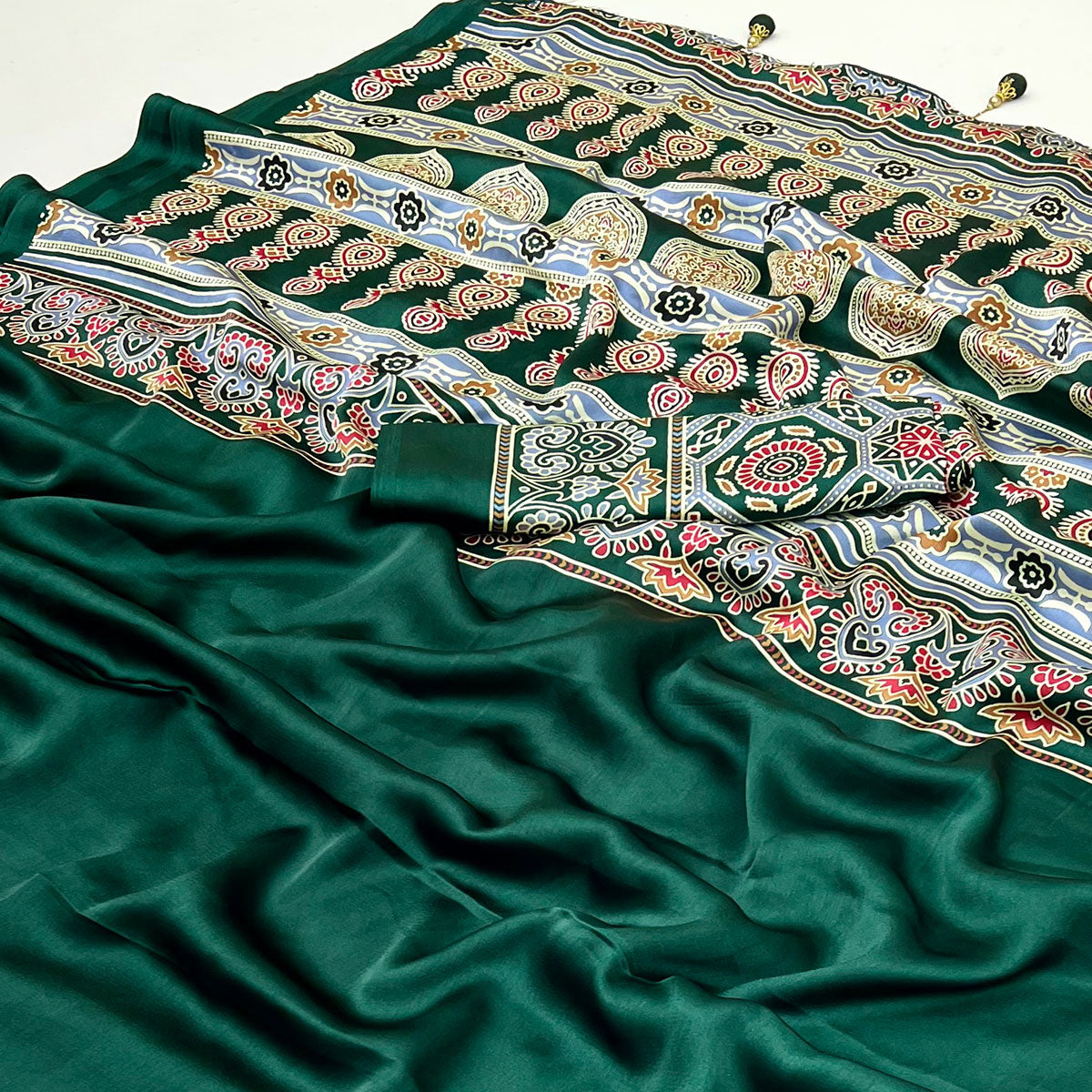 green-ajrakh-printed-crepe-satin-saree-with-tassels
