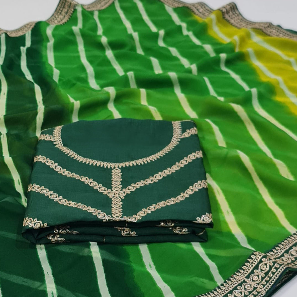 green-printed-georgette-saree-with-lace-border