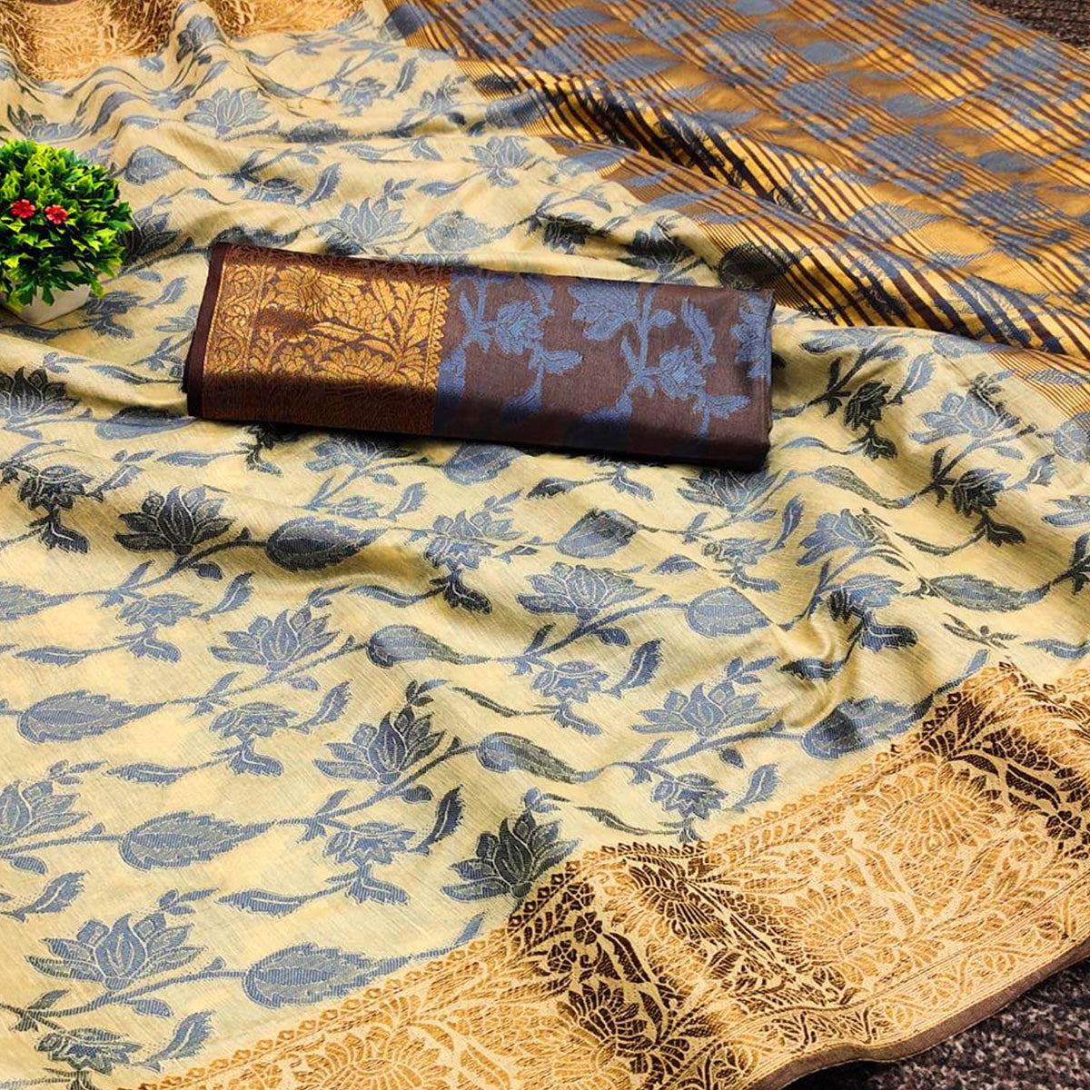 Cream Floral Woven Cotton Silk Saree With Tassels