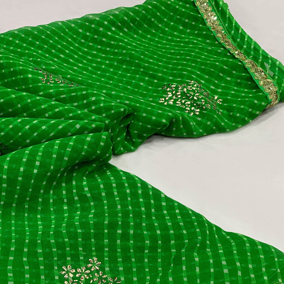 green-printed-georgette-saree-with-lace-border-5