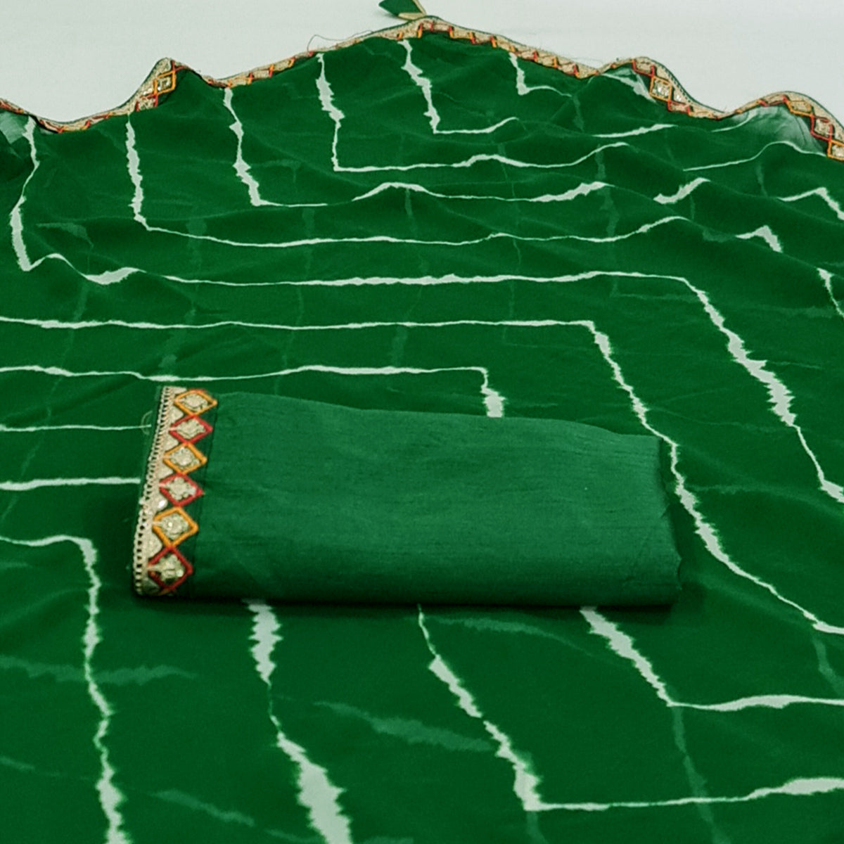 green-printed-georgette-saree-with-sequins-border