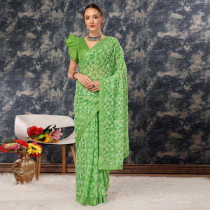 green-geometric-printed-chiffon-saree-with-lace-border