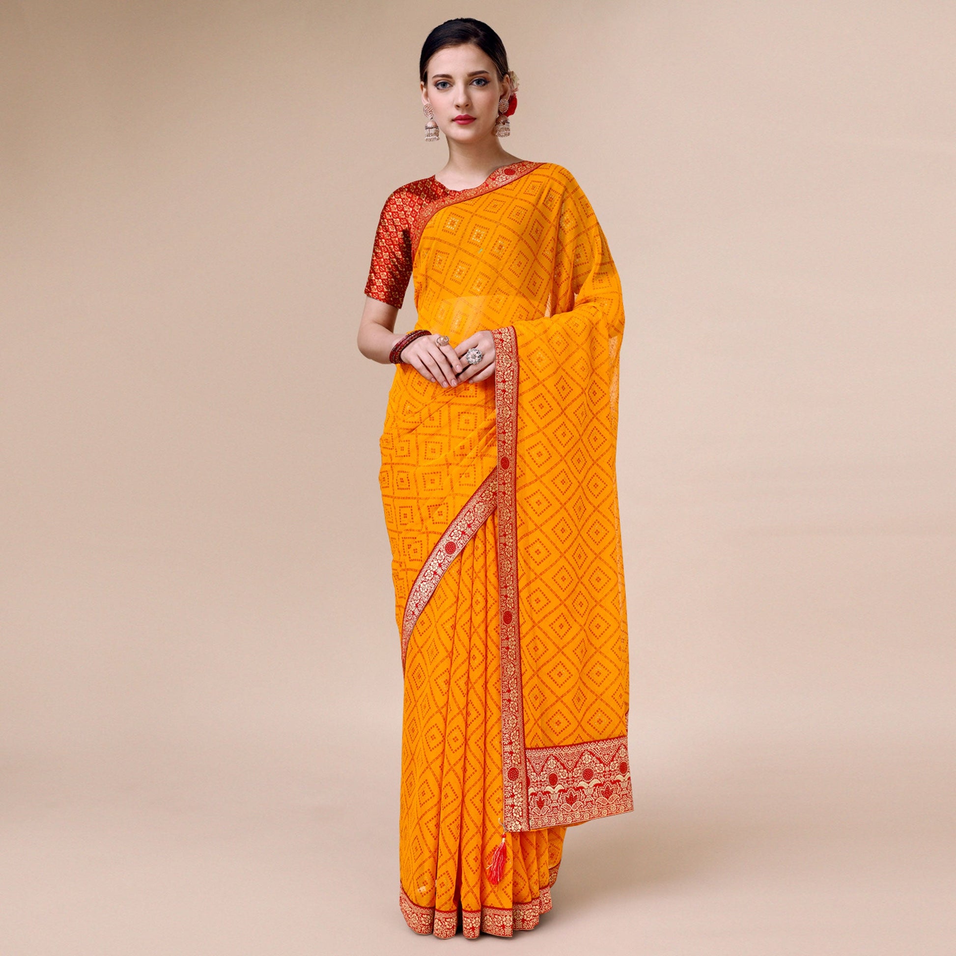 Bright Orange Bandhani Foil Printed Chiffon Saree With Tassels