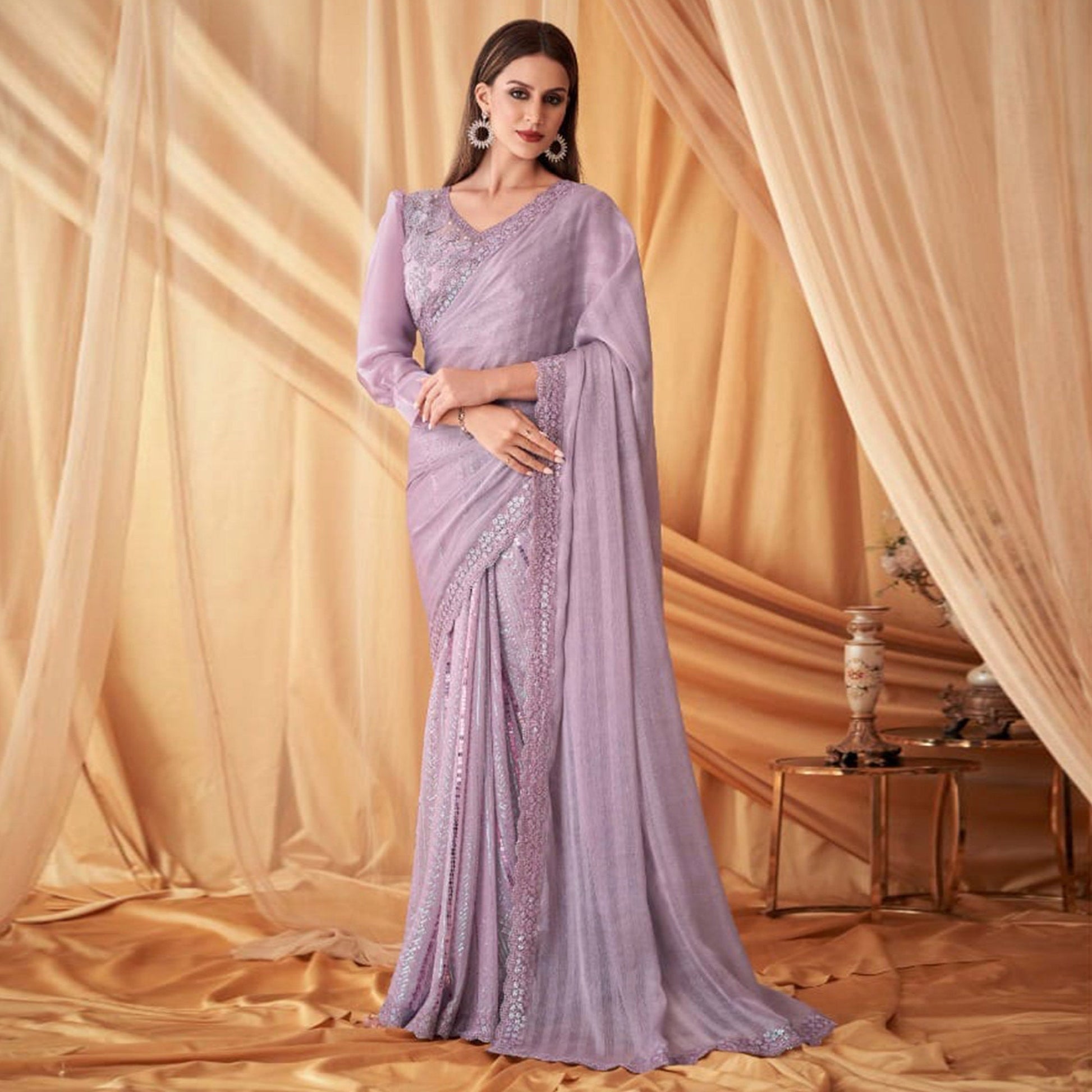 Light Purple Sequins Embroidered Georgette Saree With Tassels