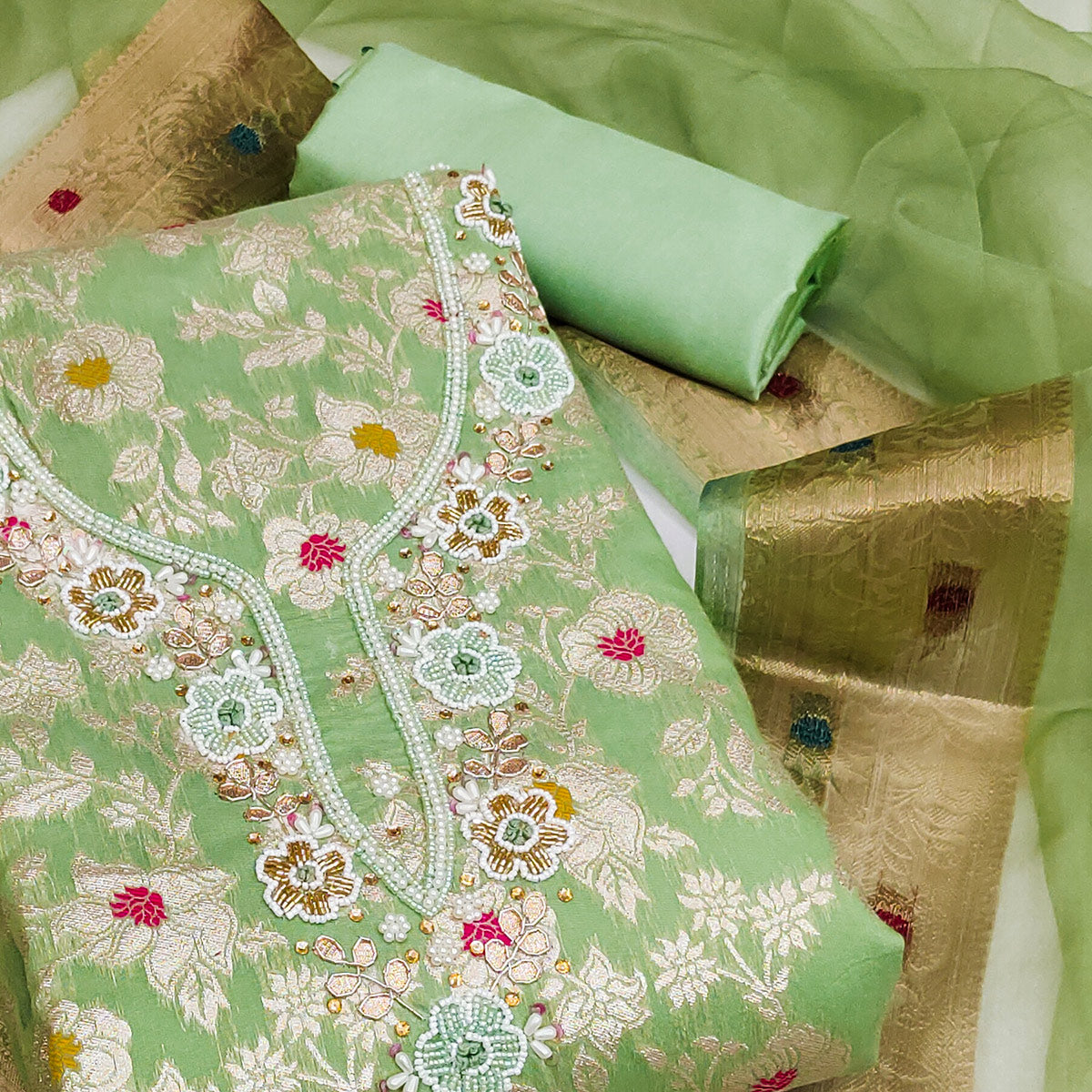 green-floral-woven-with-hand-embroidery-muslin-dress-material