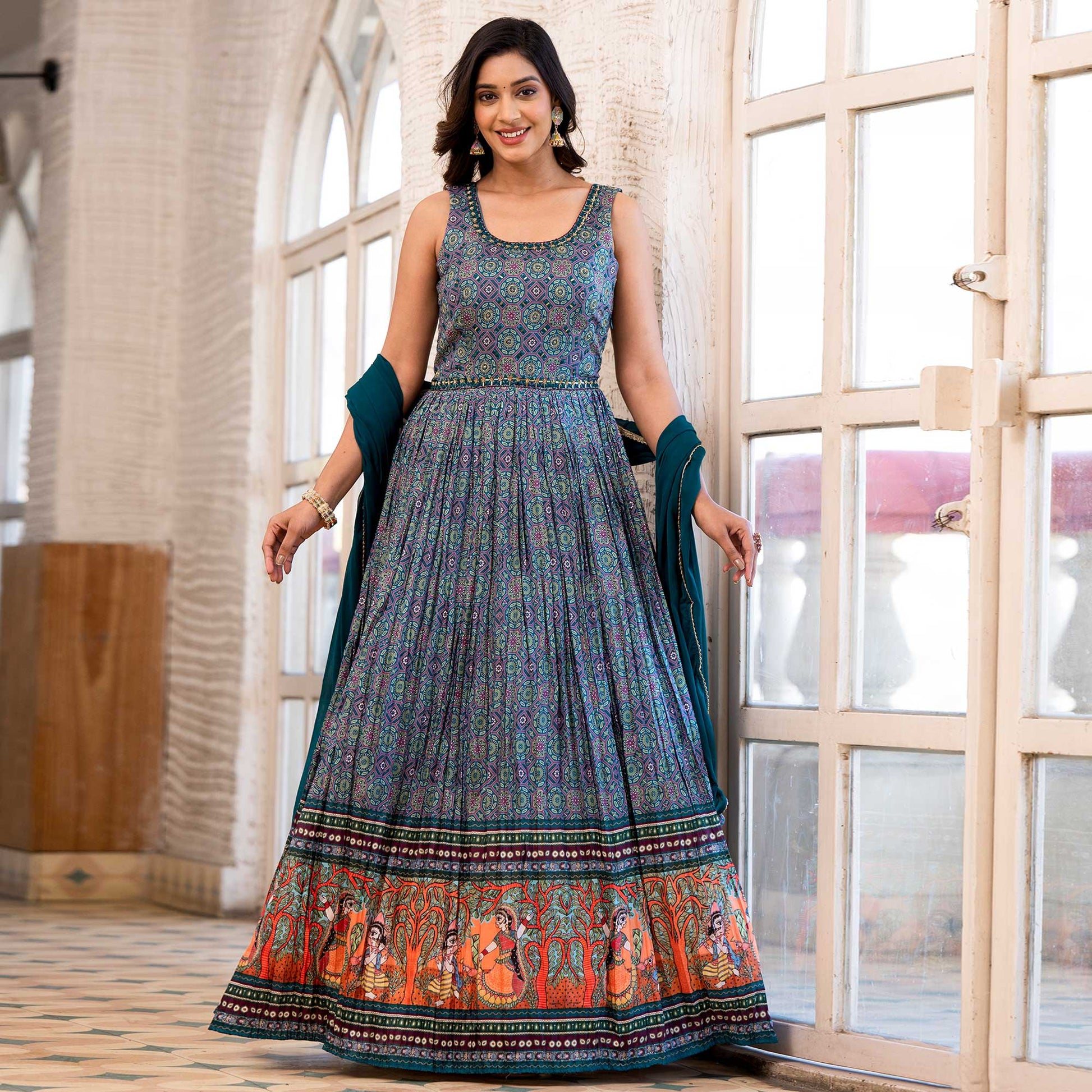 Morpich Blue Printed Dola Silk Anarkali Style Gown With Mirror Work