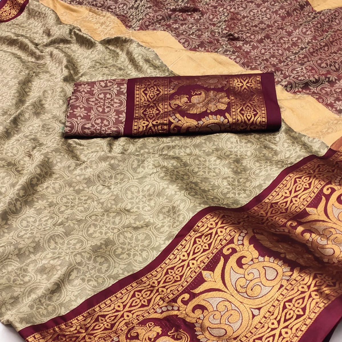 Chikoo Floral Woven Cotton Silk Saree With Tassels