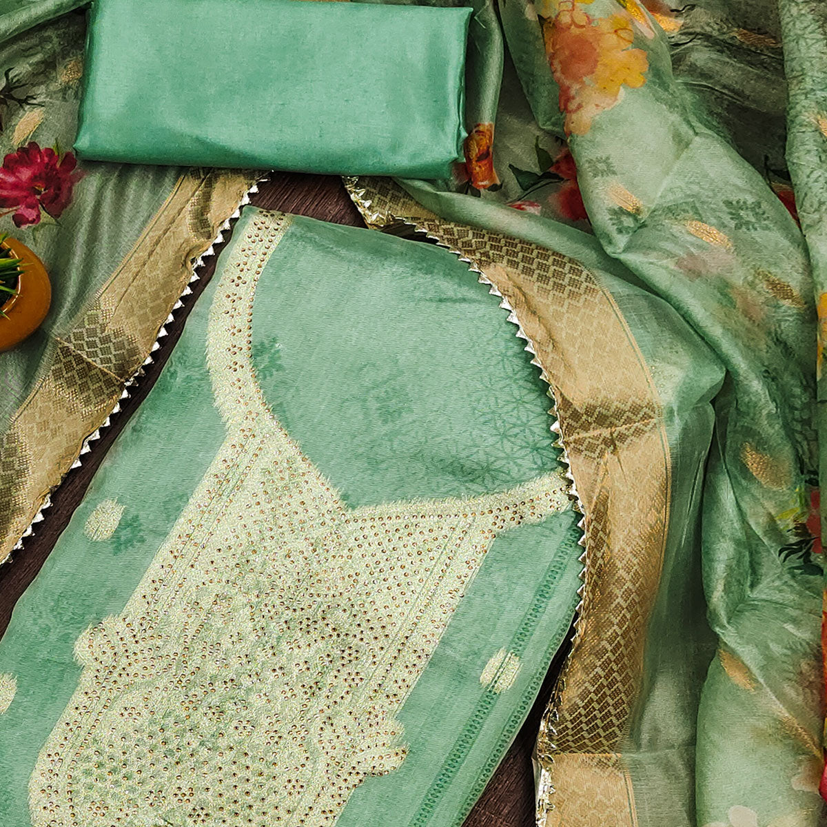 green-floral-woven-with-stonework-organza-dress-material