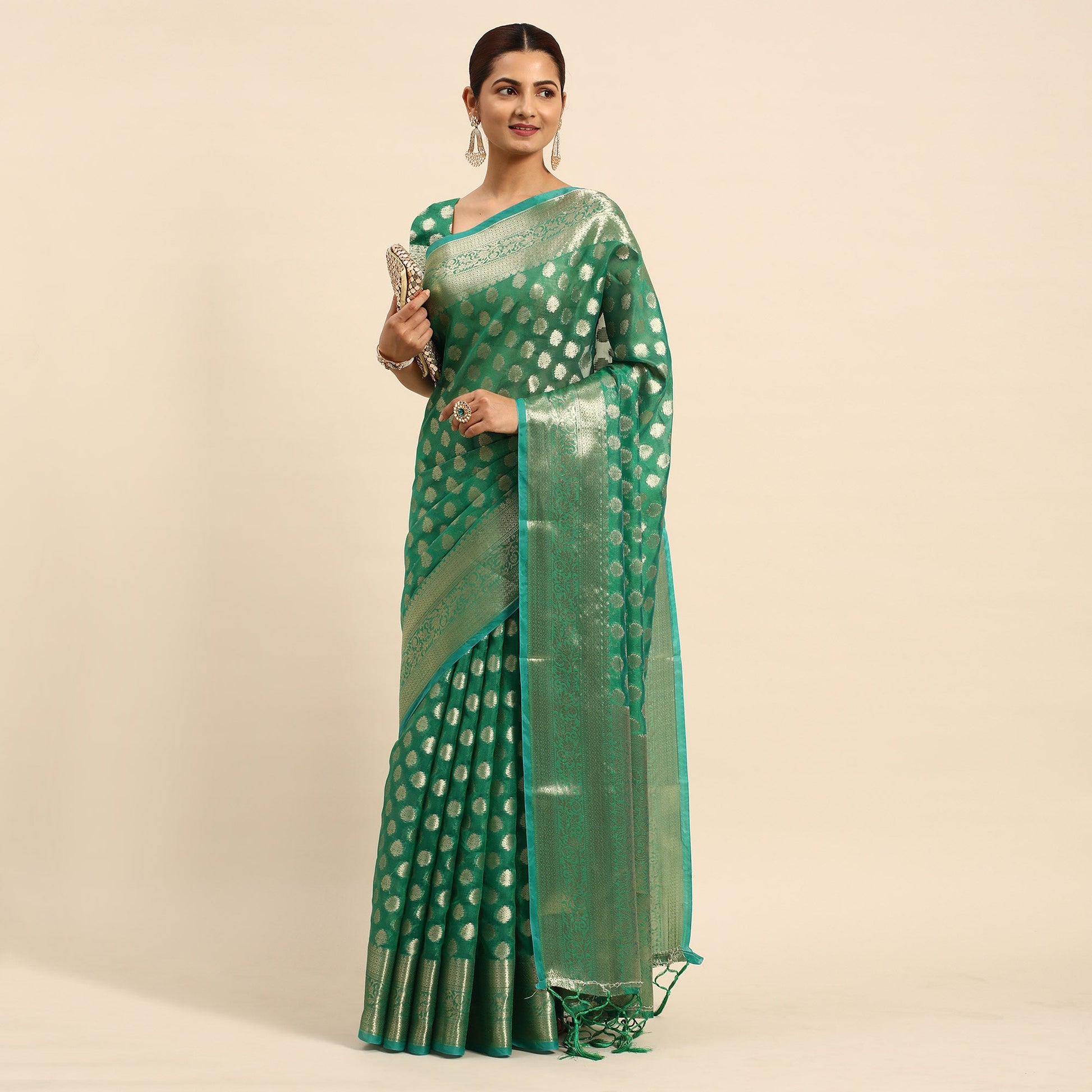 green-woven-organza-silk-saree-with-tassels-2