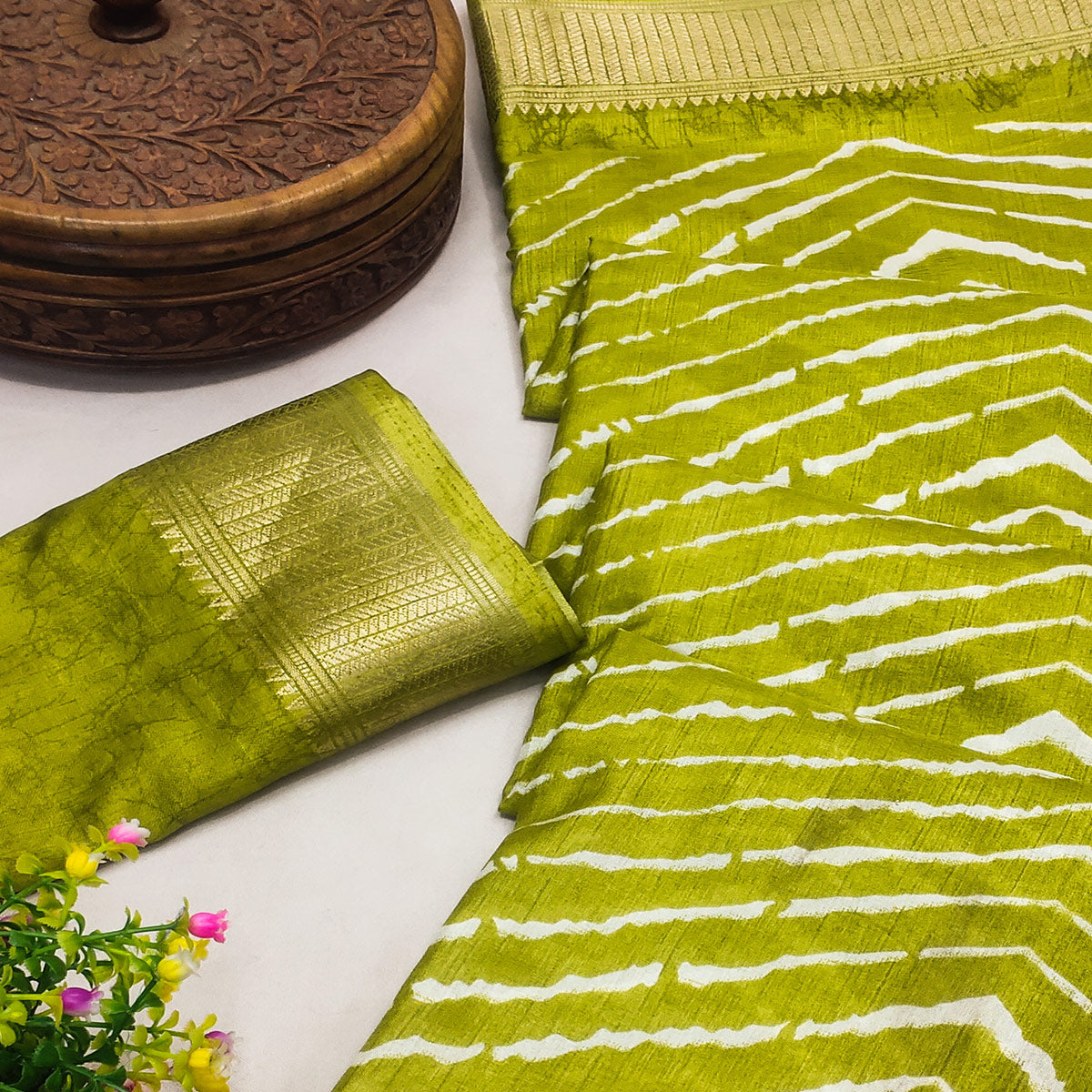 green-lehriya-printed-dola-silk-saree-with-zari-border