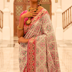 Chikoo Patola Printed Banarasi Silk Saree With Tassels