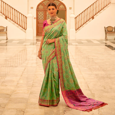 green-patola-printed-banarasi-silk-saree-with-tassels