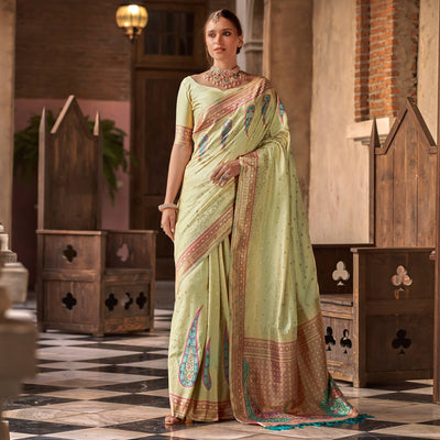 Chikoo Floral Woven Banarasi Silk Saree With Tassels