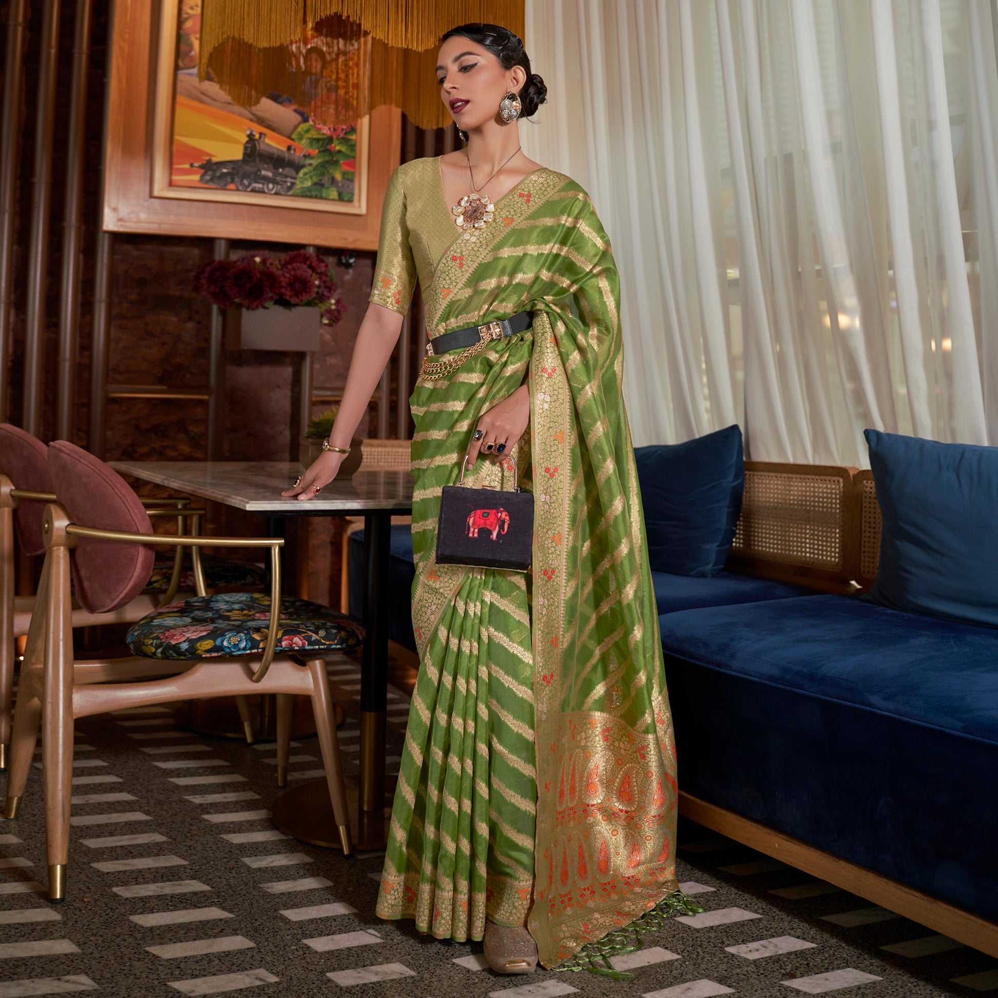 green-woven-organza-saree-with-tassels-24