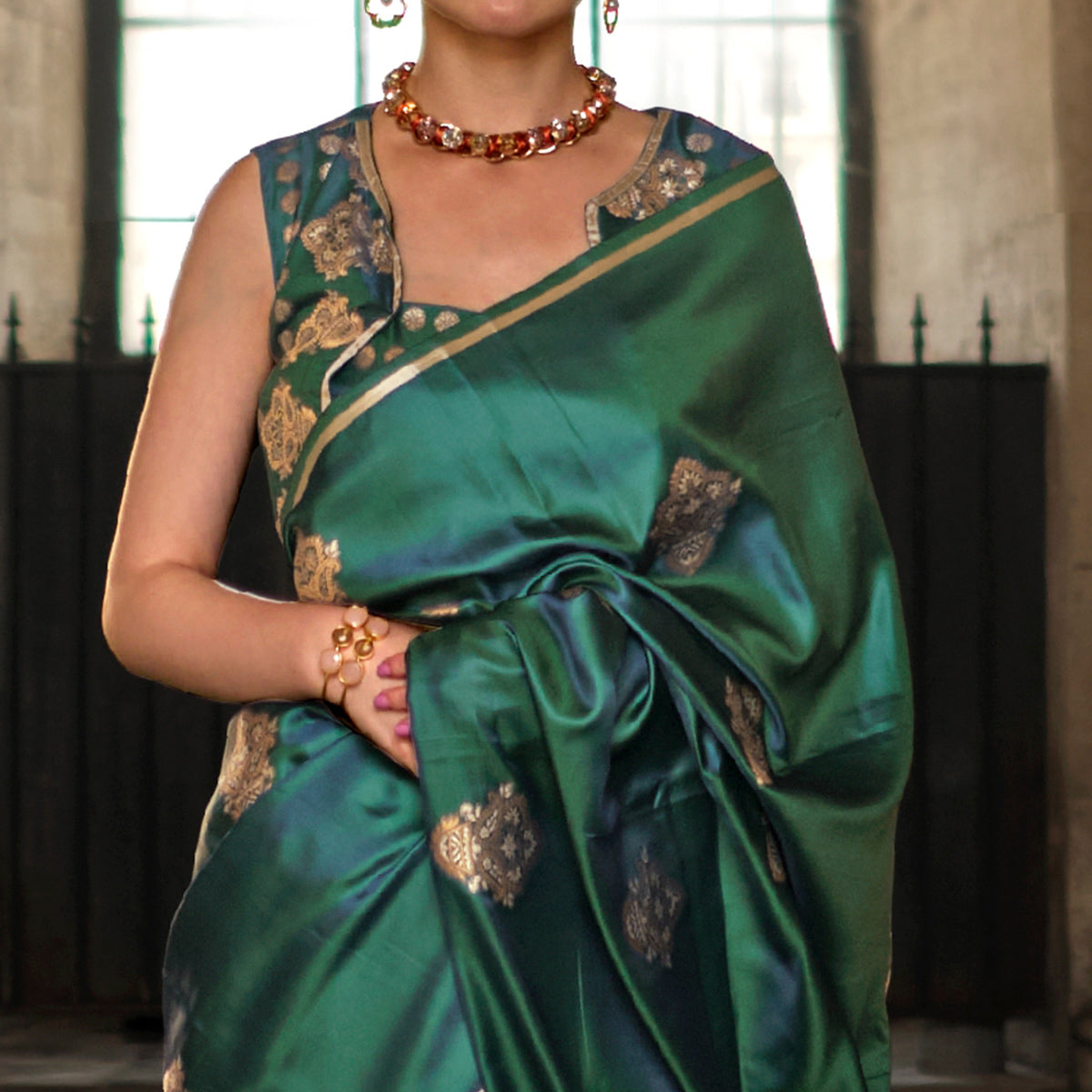 green-floral-woven-satin-saree-with-tassels