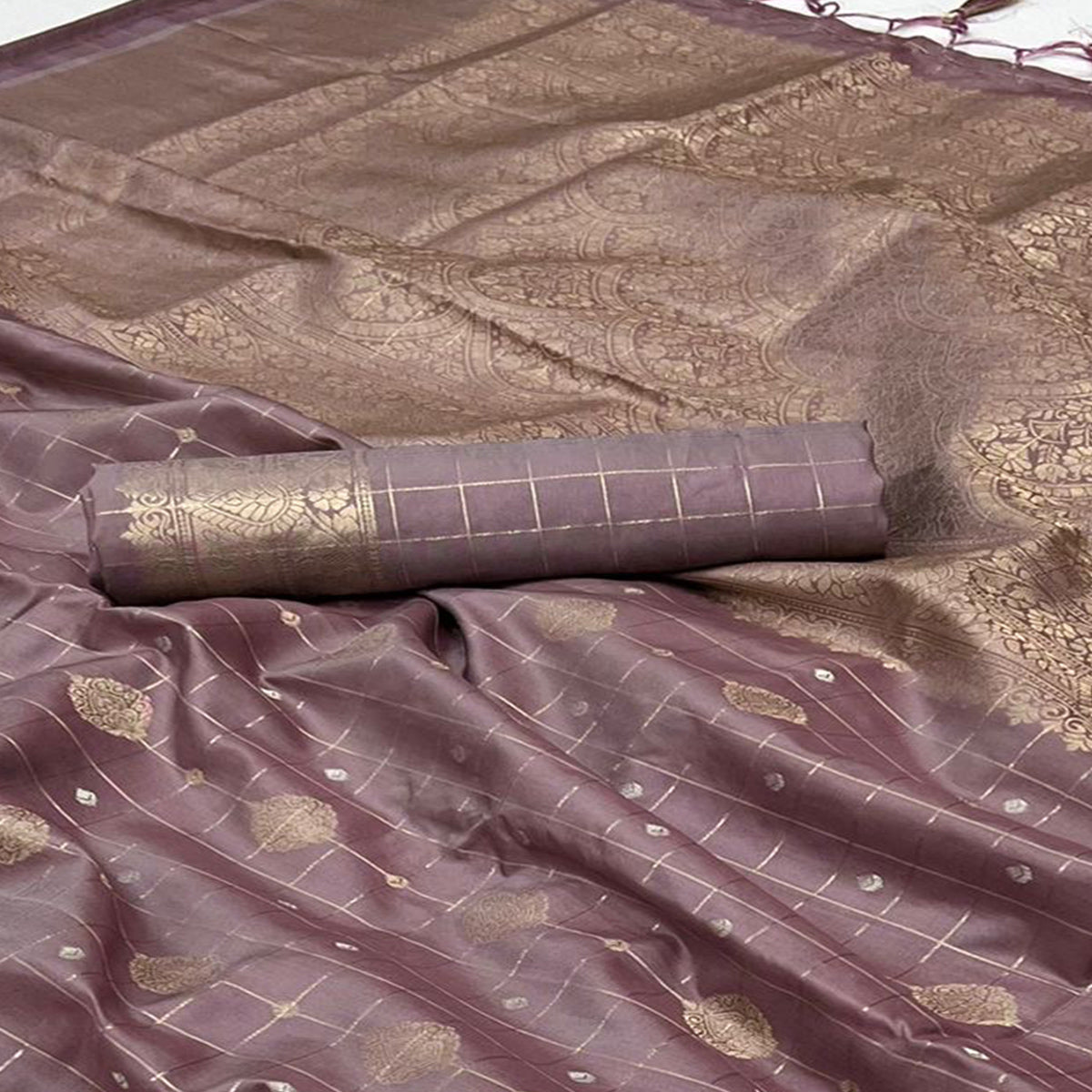 Mauve Woven Art Silk Saree With Tassels