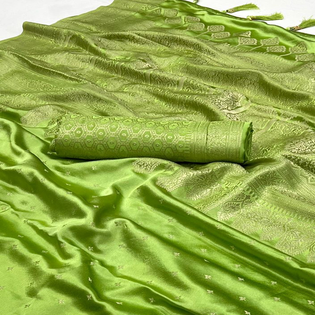green-zari-woven-satin-saree-with-tassels