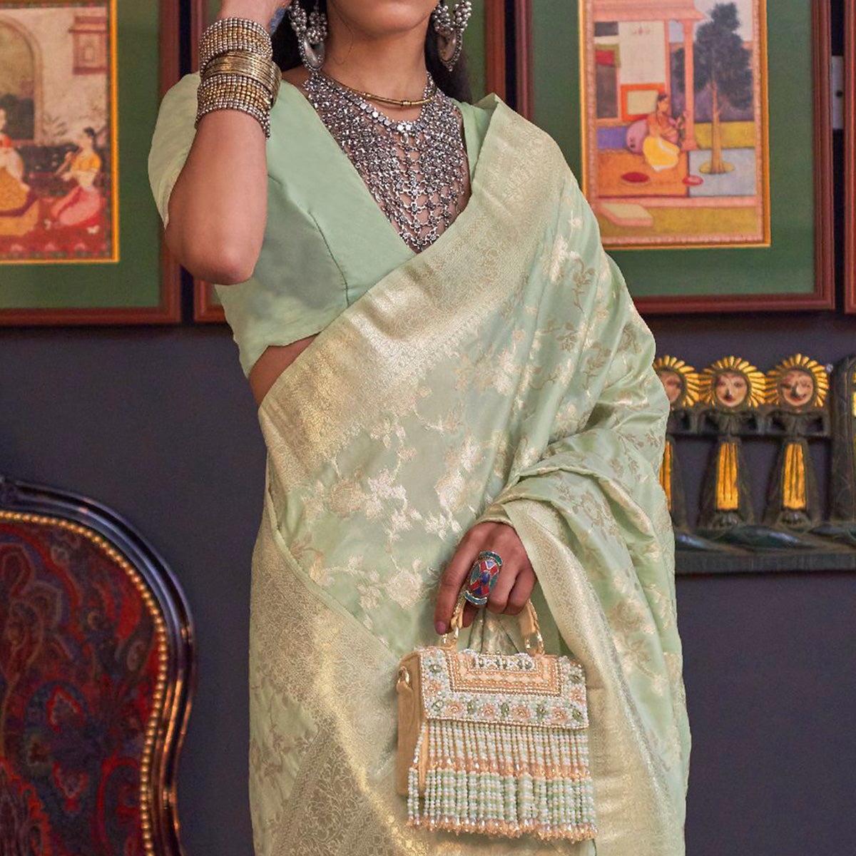 green-woven-art-silk-saree-with-tassels-17