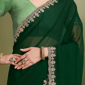 green-solid-with-zari-embroidered-georgette-saree