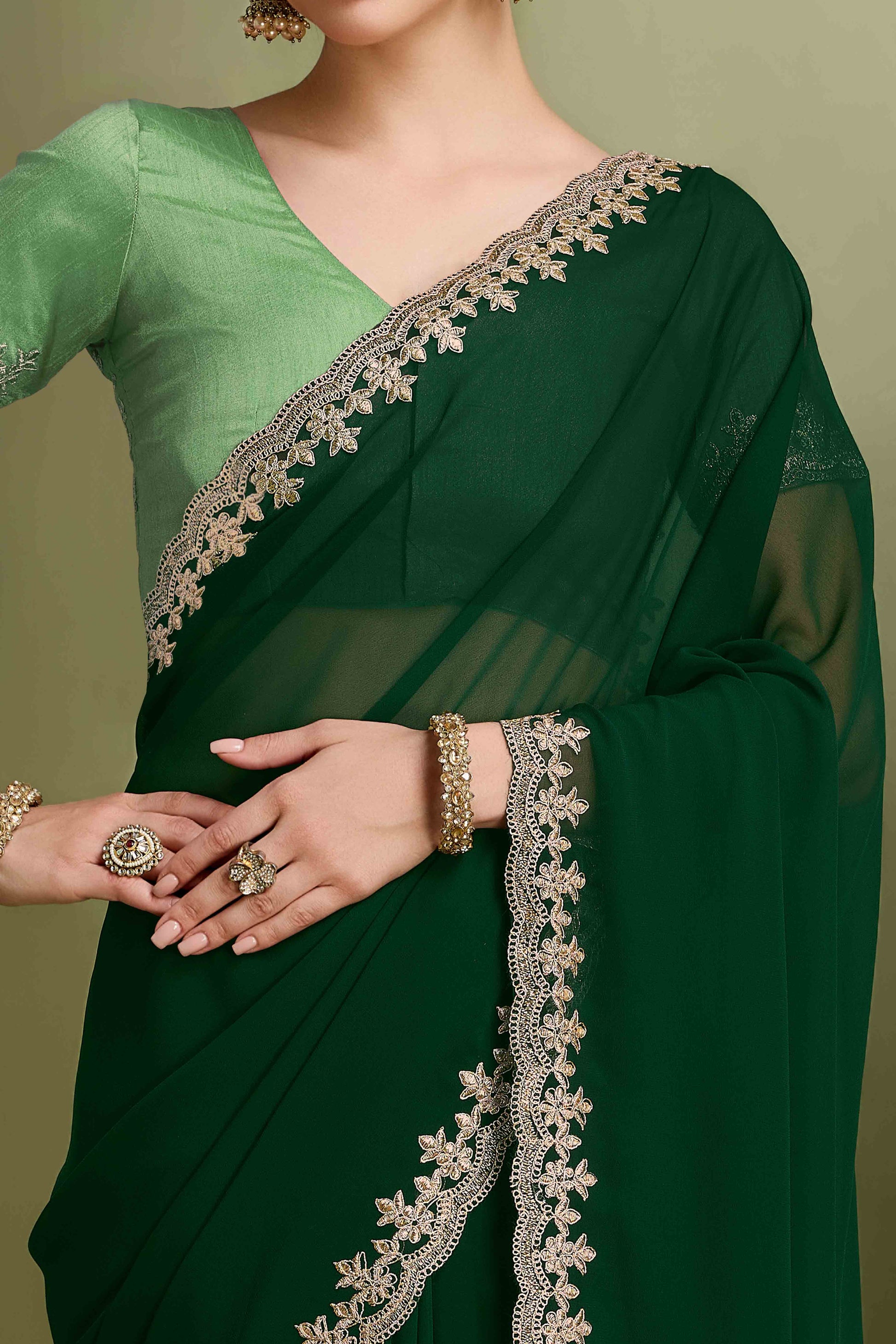 green-solid-with-zari-embroidered-georgette-saree