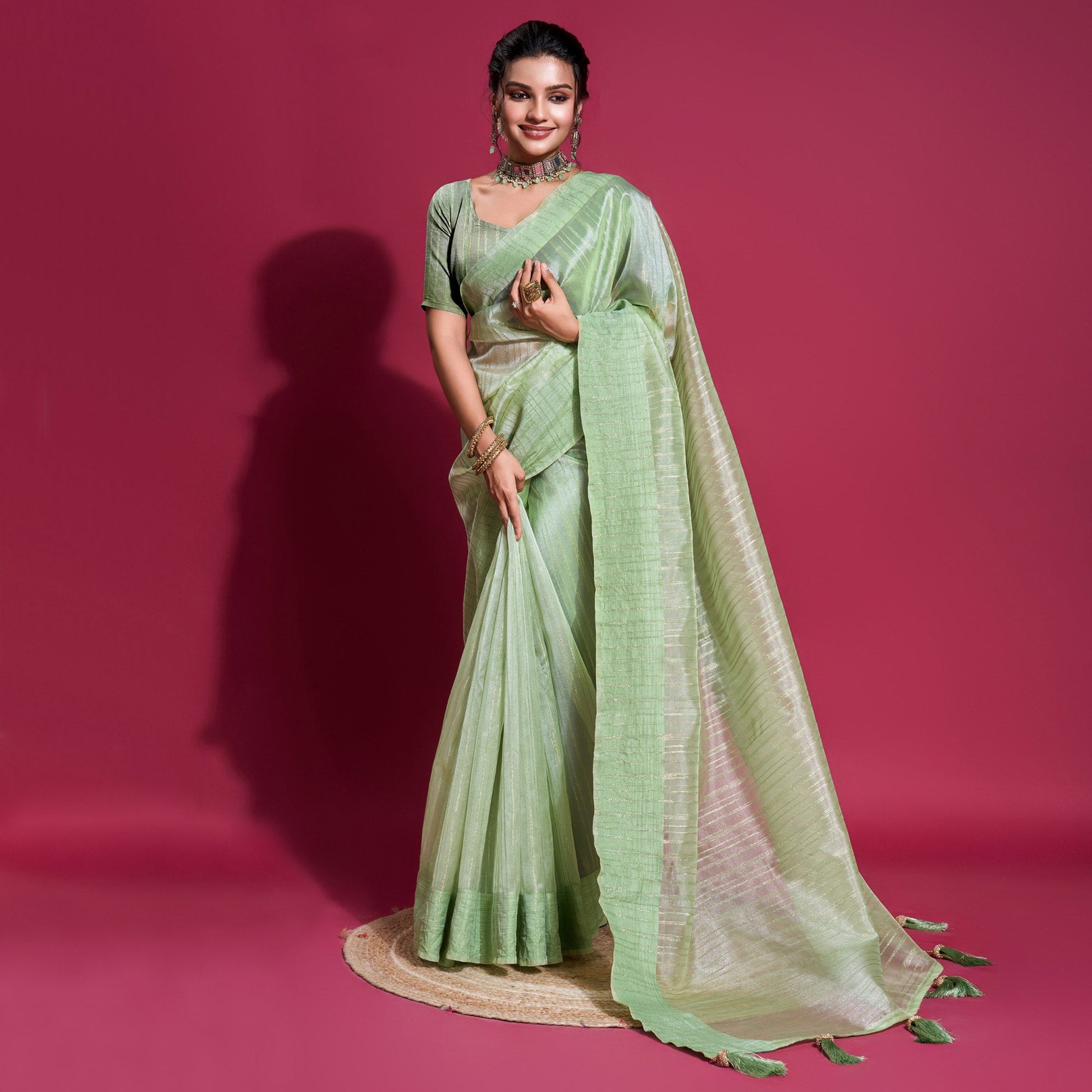 green-woven-organza-zari-saree-withtassels