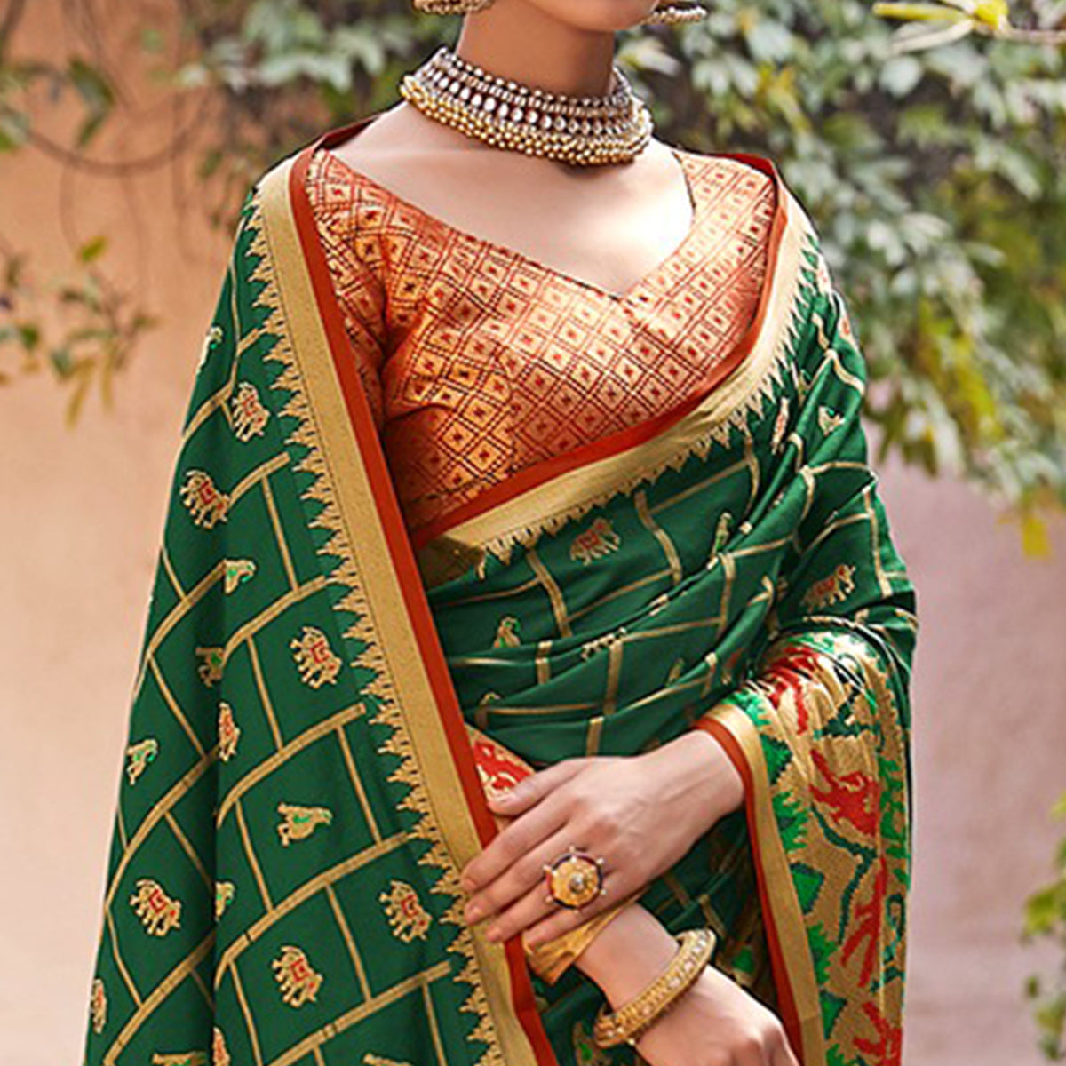 green-woven-patola-art-silk-saree