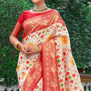 Cream Woven Art Silk Patola Saree With Tassels
