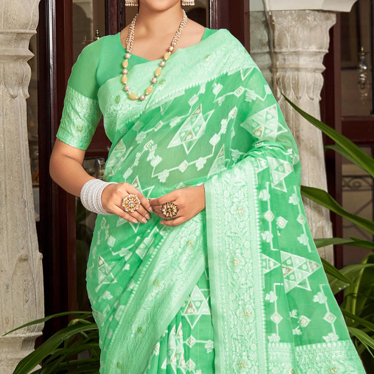 green-woven-cotton-silk-saree-with-tassels-13