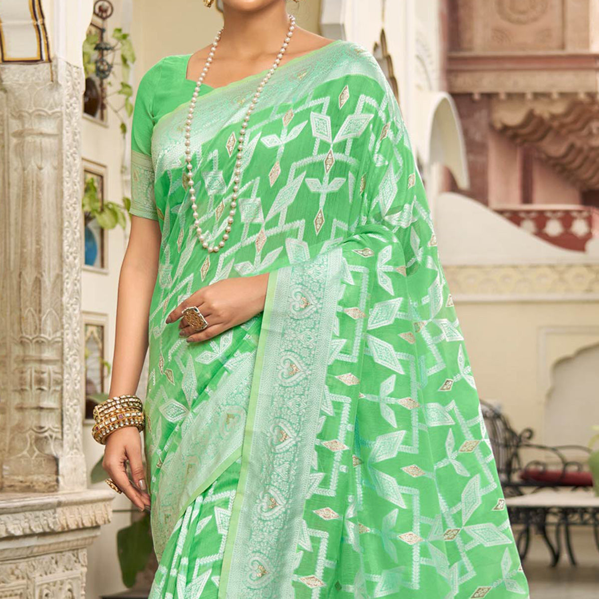 green-woven-cotton-silk-saree-with-tassels-14