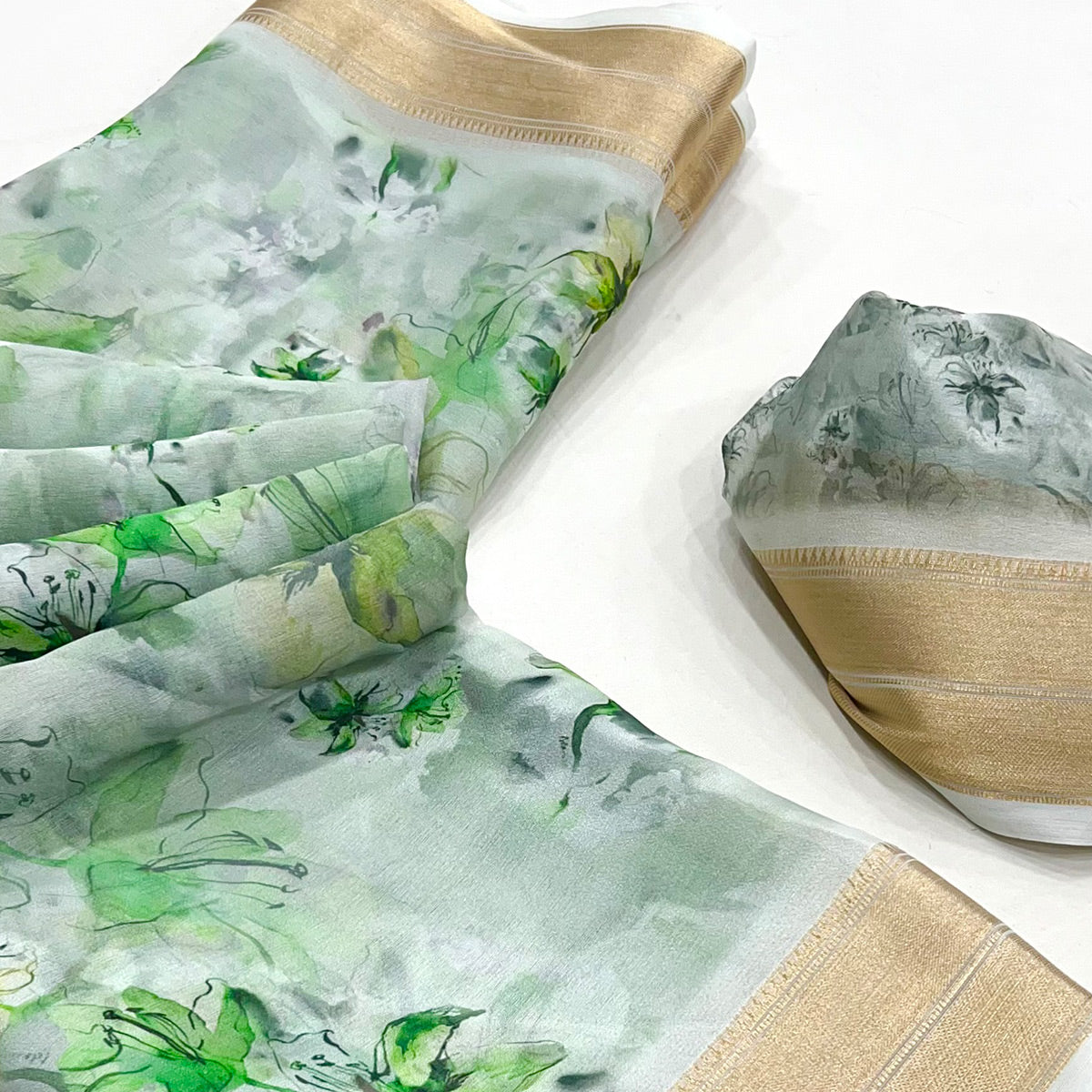 green-floral-digital-printed-georgette-saree-with-zari-border