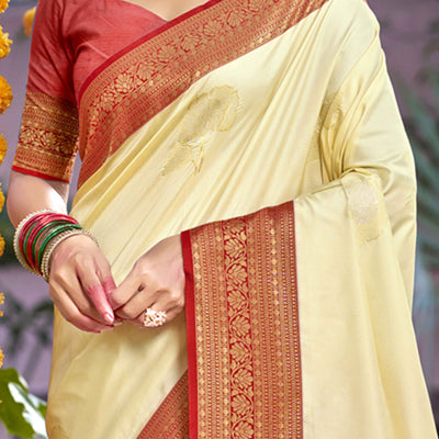 Cream Floral Woven Banarasi Silk Saree With Tassels