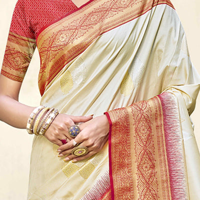 Cream Woven Banarasi Silk Saree With Tassels