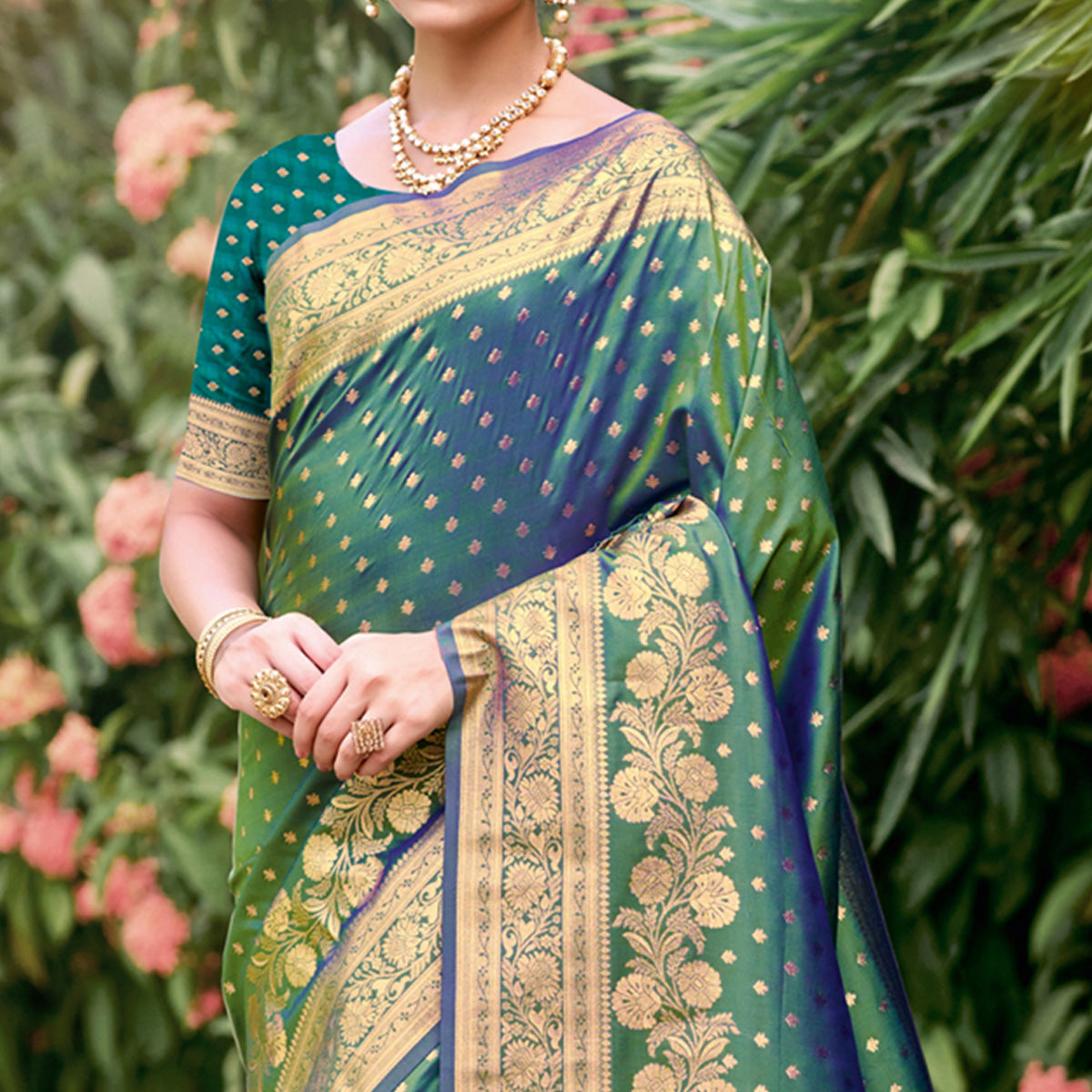 green-floral-woven-banarasi-silk-saree-with-tassels-11