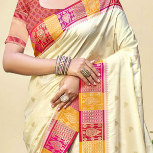Cream Woven Banarasi Silk Saree With Tassels