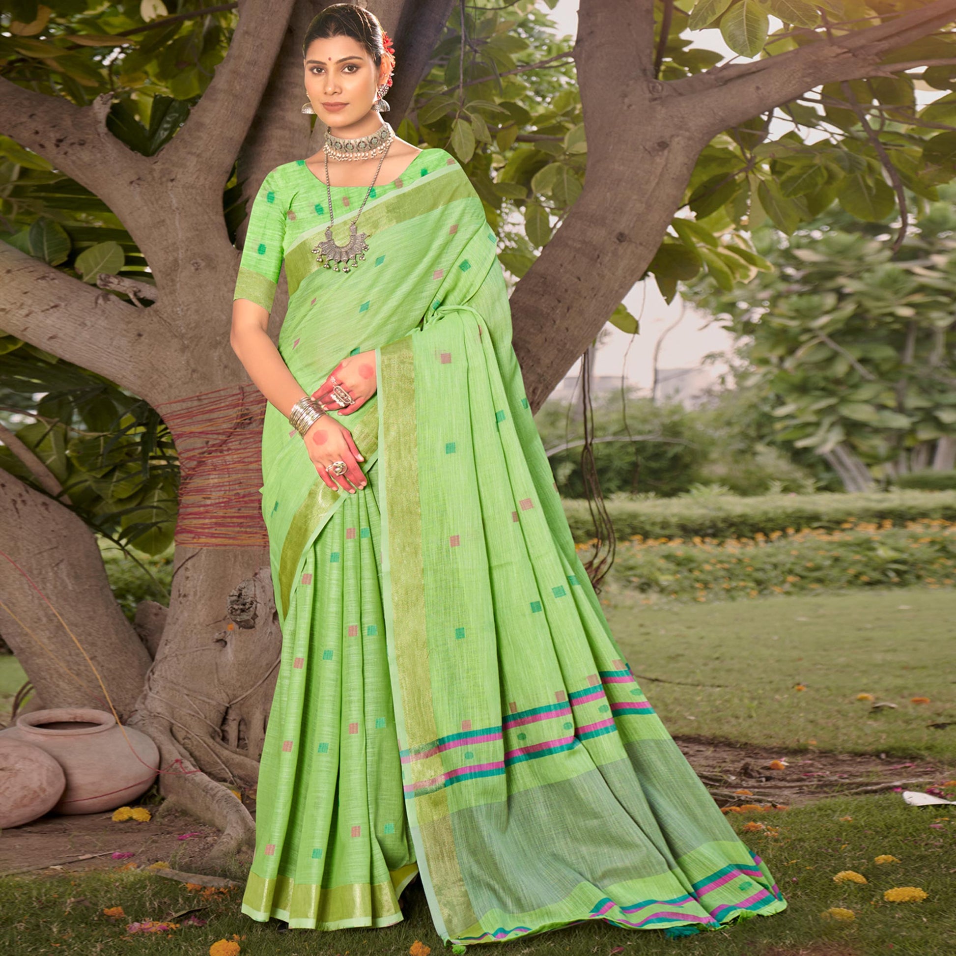 green-woven-cotton-blend-saree-with-tassels-3