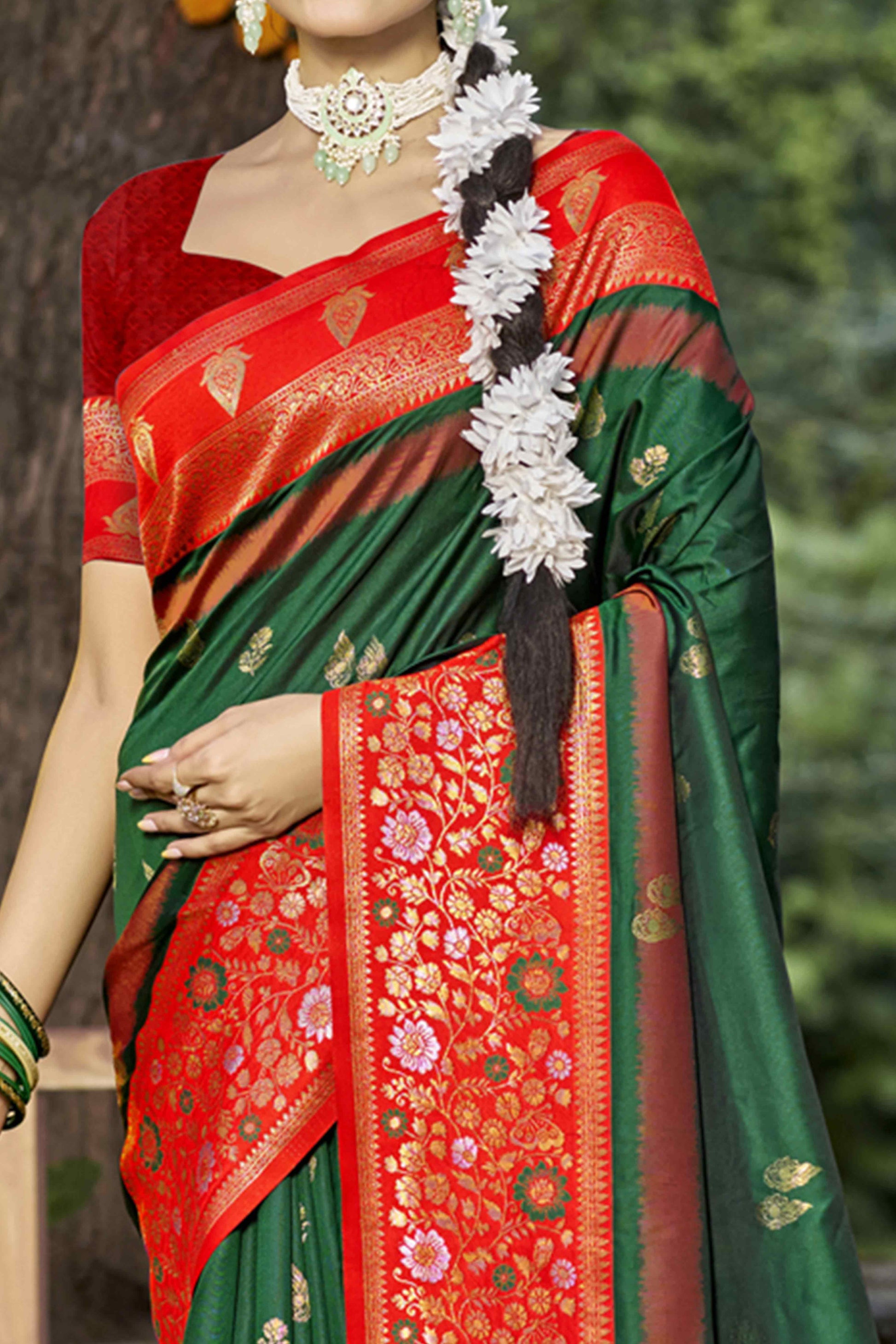 green-floral-woven-banarasi-silk-saree-with-tassels-13