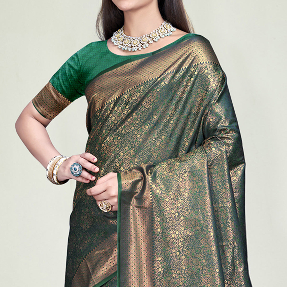 green-floral-woven-banarasi-silk-saree-with-tassels-10