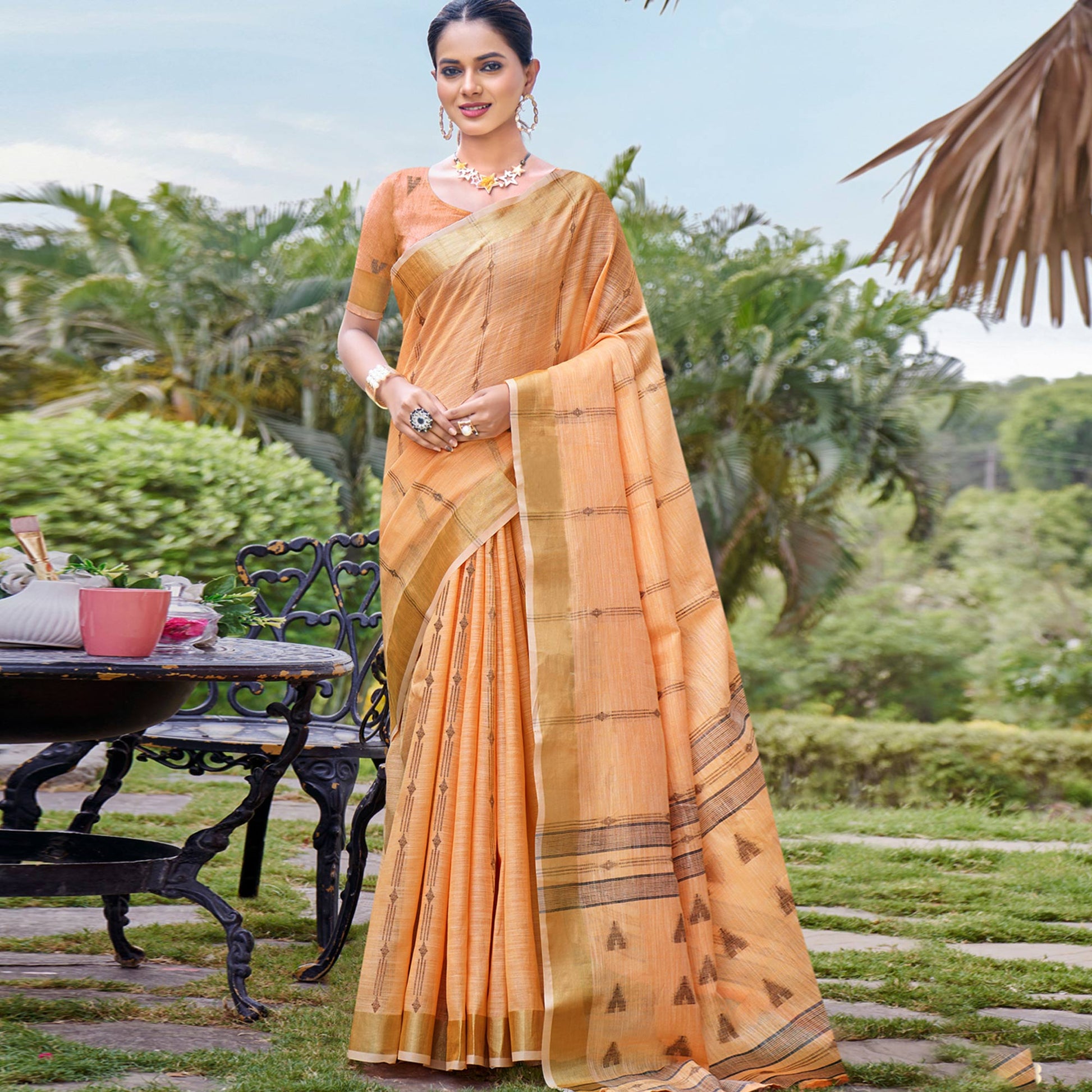 Light Orange Woven Cotton Blend Saree With Tassels