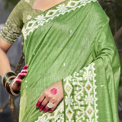 Light Green Woven Linen Cotton Saree With Tassels