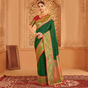 green-floral-woven-banarasi-silk-saree-with-tassels-7