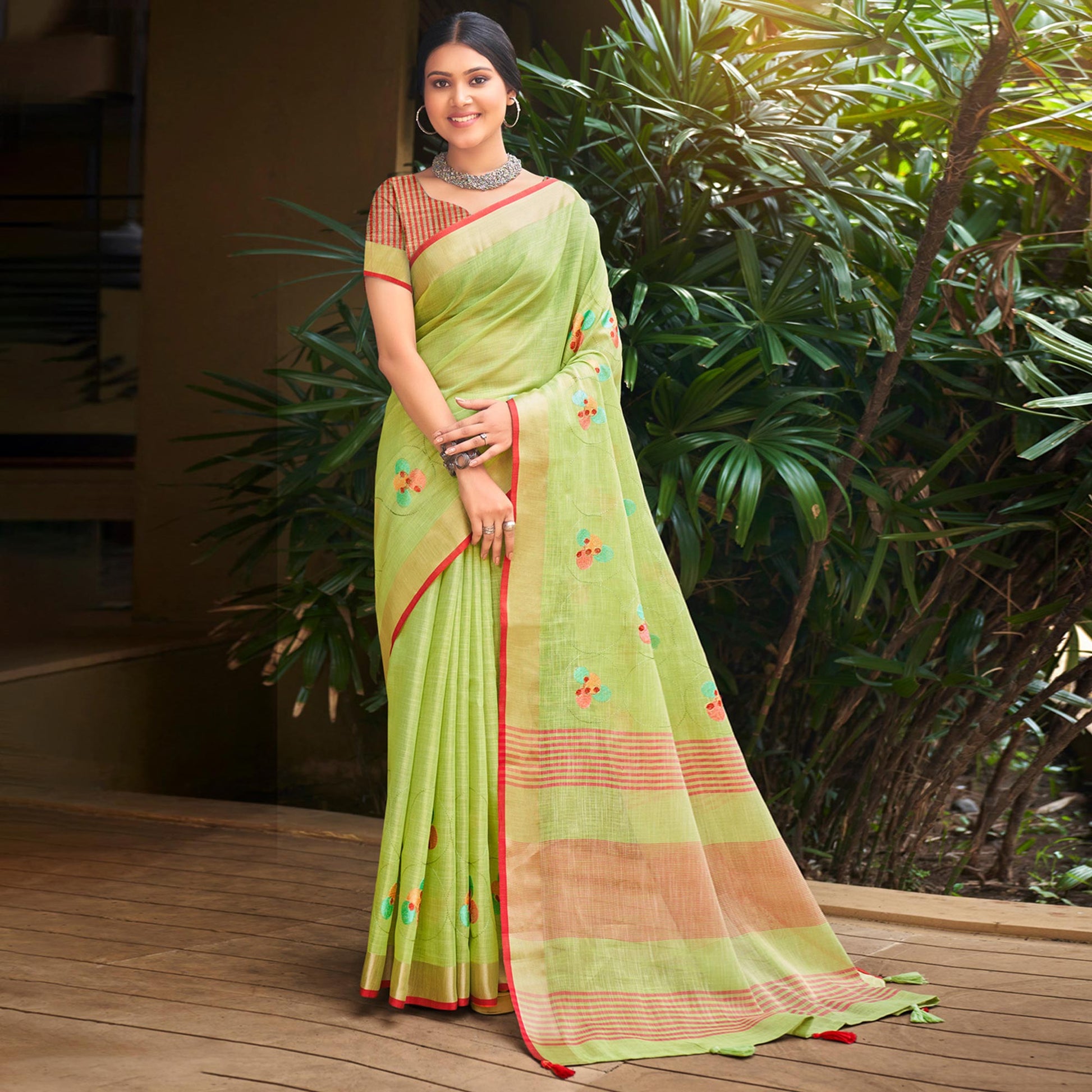 green-floral-embroidered-linen-saree-with-tassels-1
